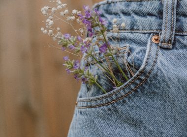 purple flower on blue denim shorts