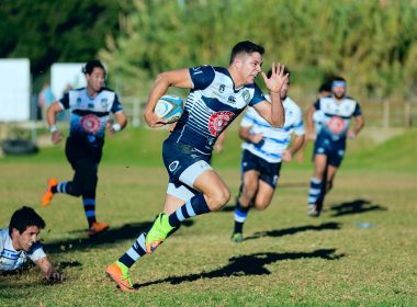 team playing rugby sport