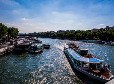 white and brown boat on water during daytime