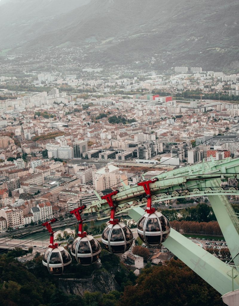 white-and-black cable cars during daytime