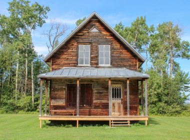 brown wooden 2-storey house during daytime