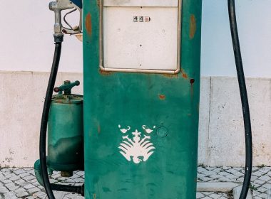 green and white gas pump