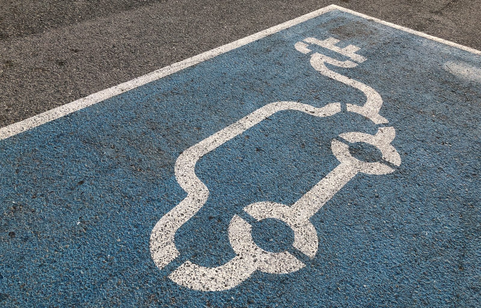 blue and white heart print on gray asphalt road