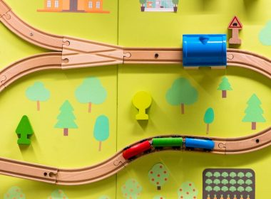 brown and multicolored train toy set