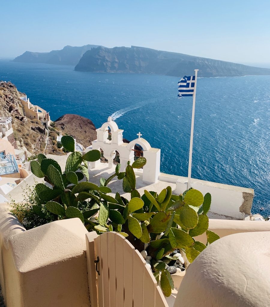 a view of a greek island from a balcony