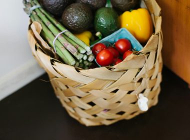 bunch of assorted produce in brown wicker basket