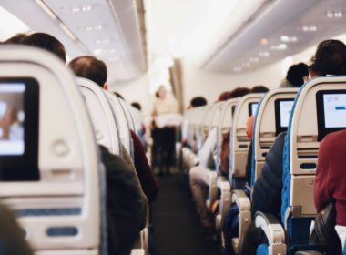 shallow focus photography of people inside of passenger plane