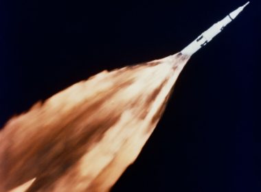 Saturn rocket with a trail of flames during launch