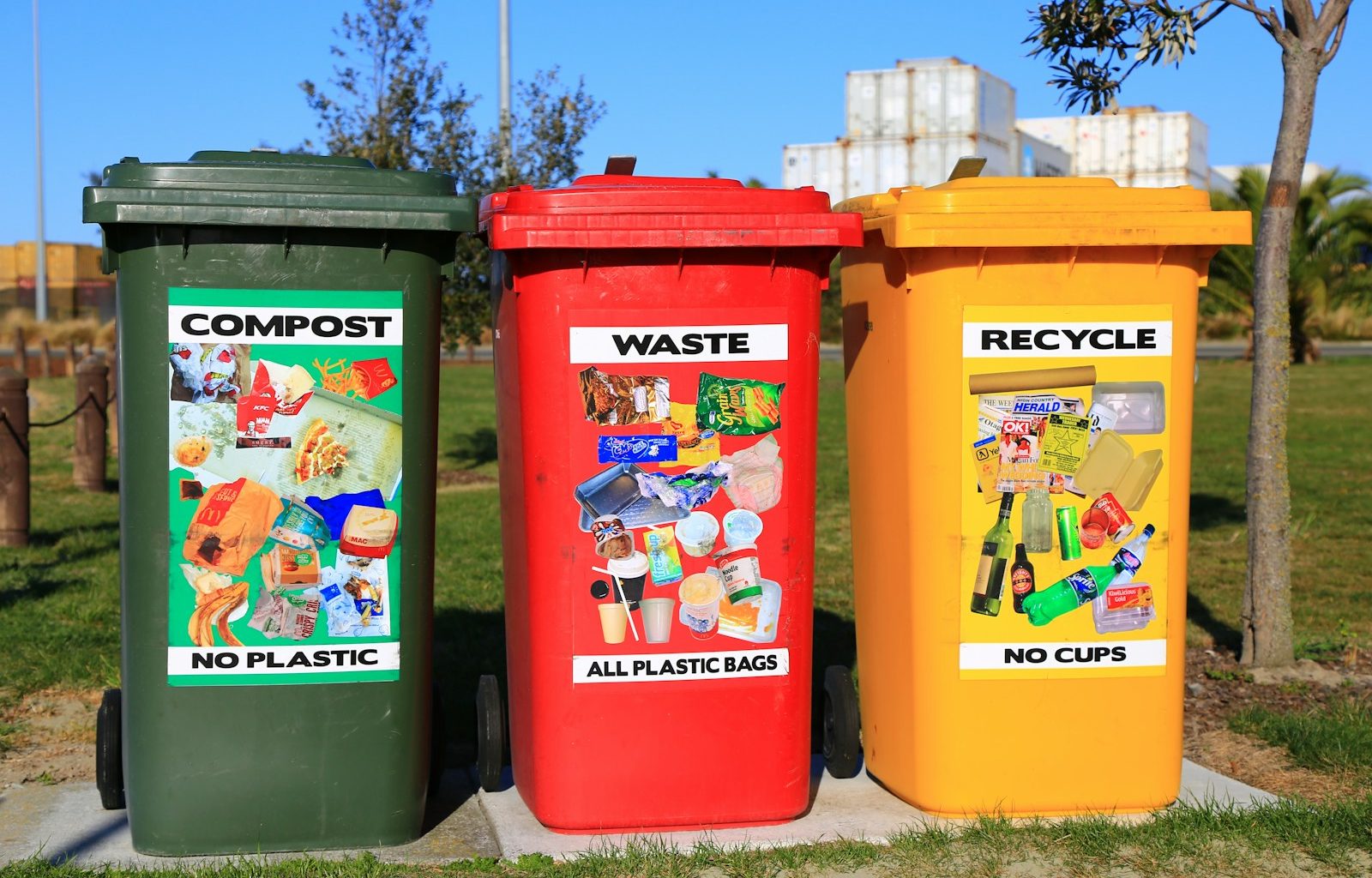 red yellow and green trash bins