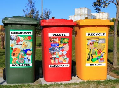 red yellow and green trash bins