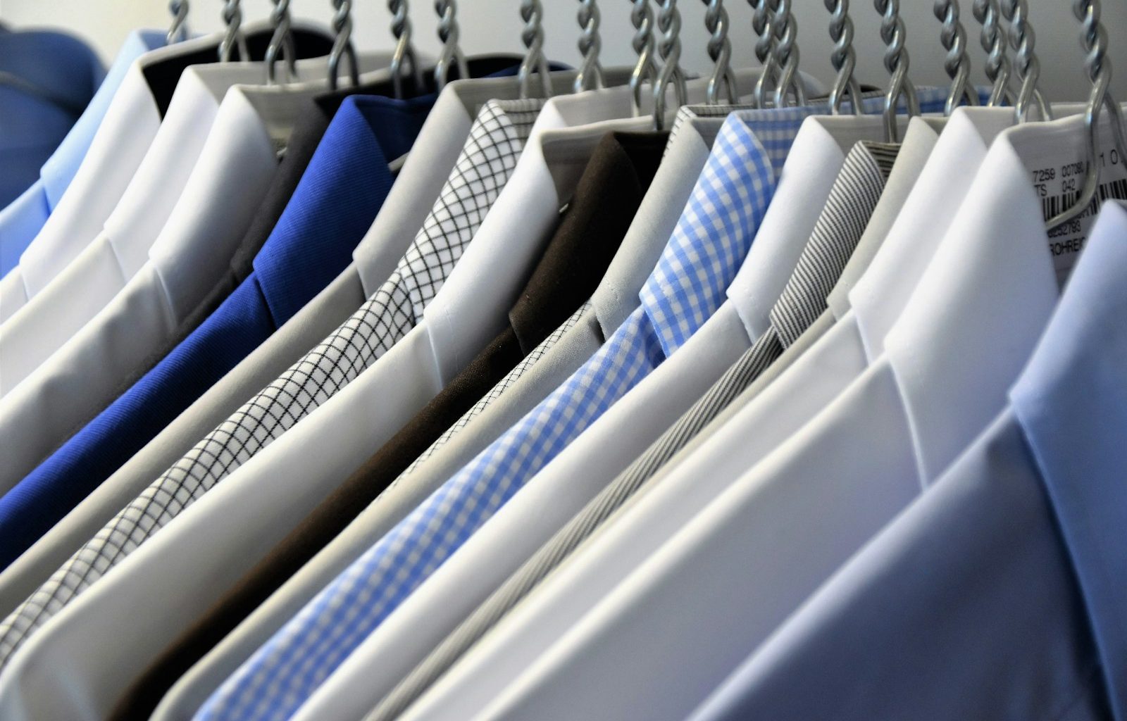hanged assorted-color dress shirts