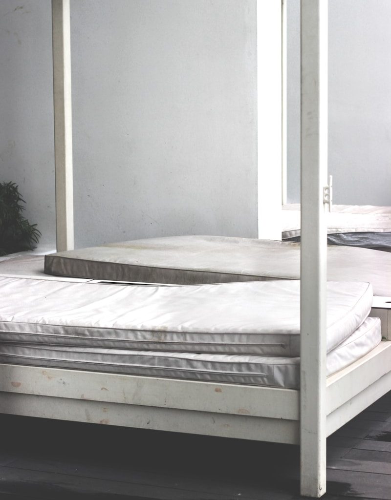 white wooden bed frame
