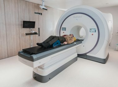 a person lying on a bed