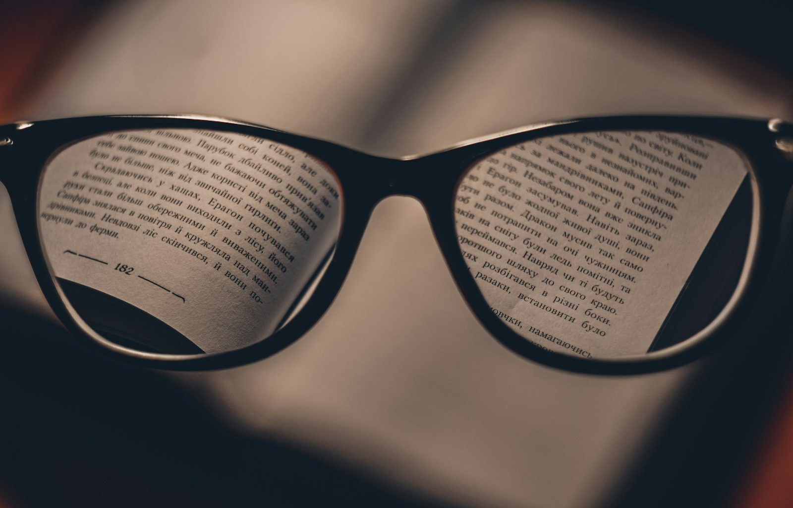 black text reflect on eyeglasses