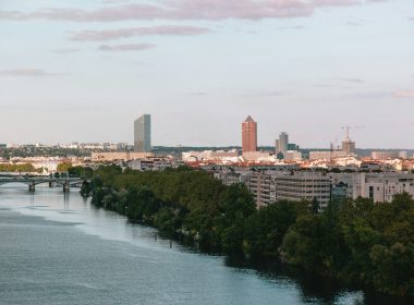 city skyline under white cloudy sky during daytime