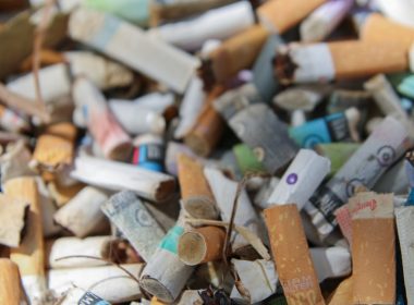 A large pile of used cigarette butts.