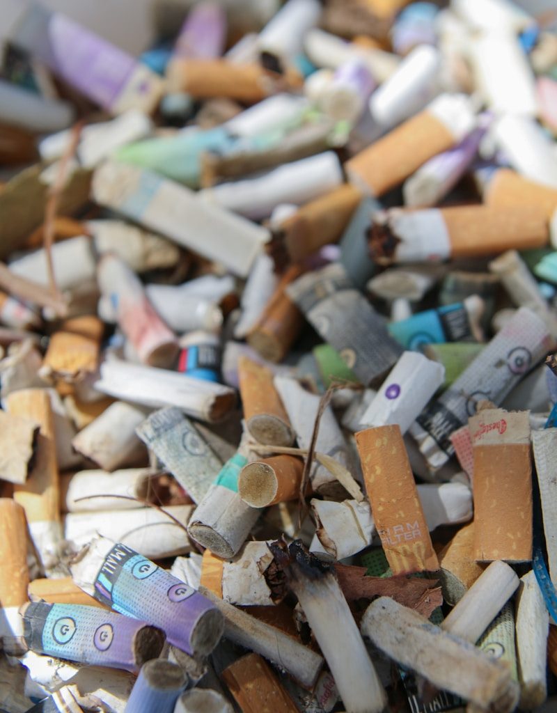 A large pile of used cigarette butts.