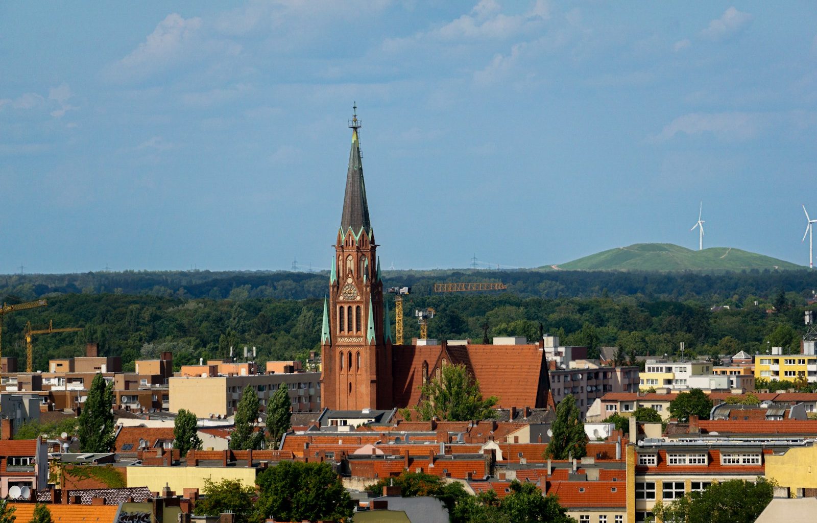 a view of a city with a church steeple