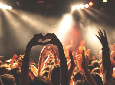 person performing heart hand gesture