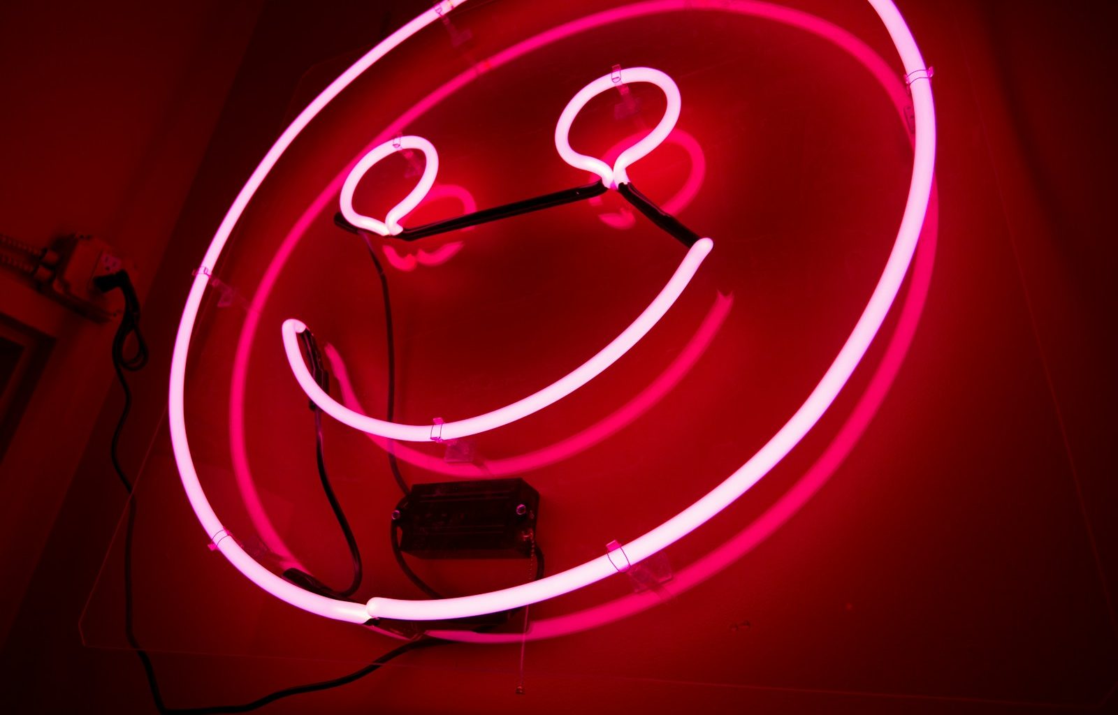 pink emoji neon signage