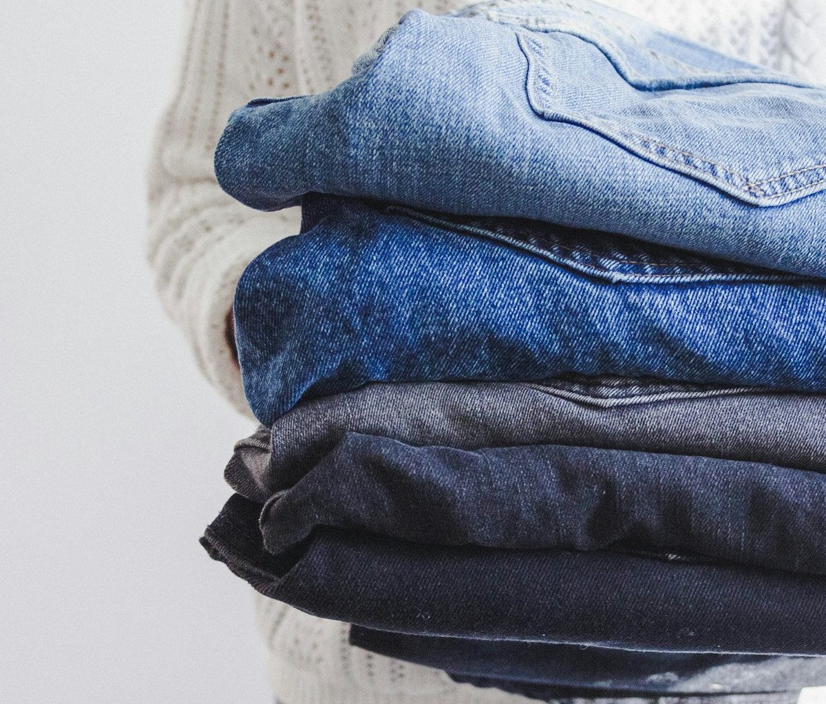 blue and white textile on white textile