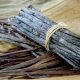a bundle of sticks sitting on top of a wooden table