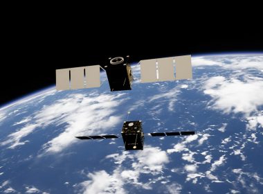 a satellite satellite flying over the earth