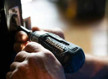 selective focus photography blue and black Makita power drill