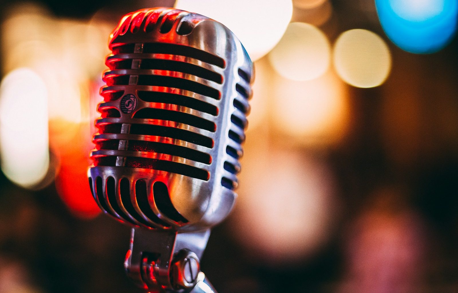 bokeh photography of condenser microphone
