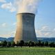 a nuclear power plant emitting smoke into the sky