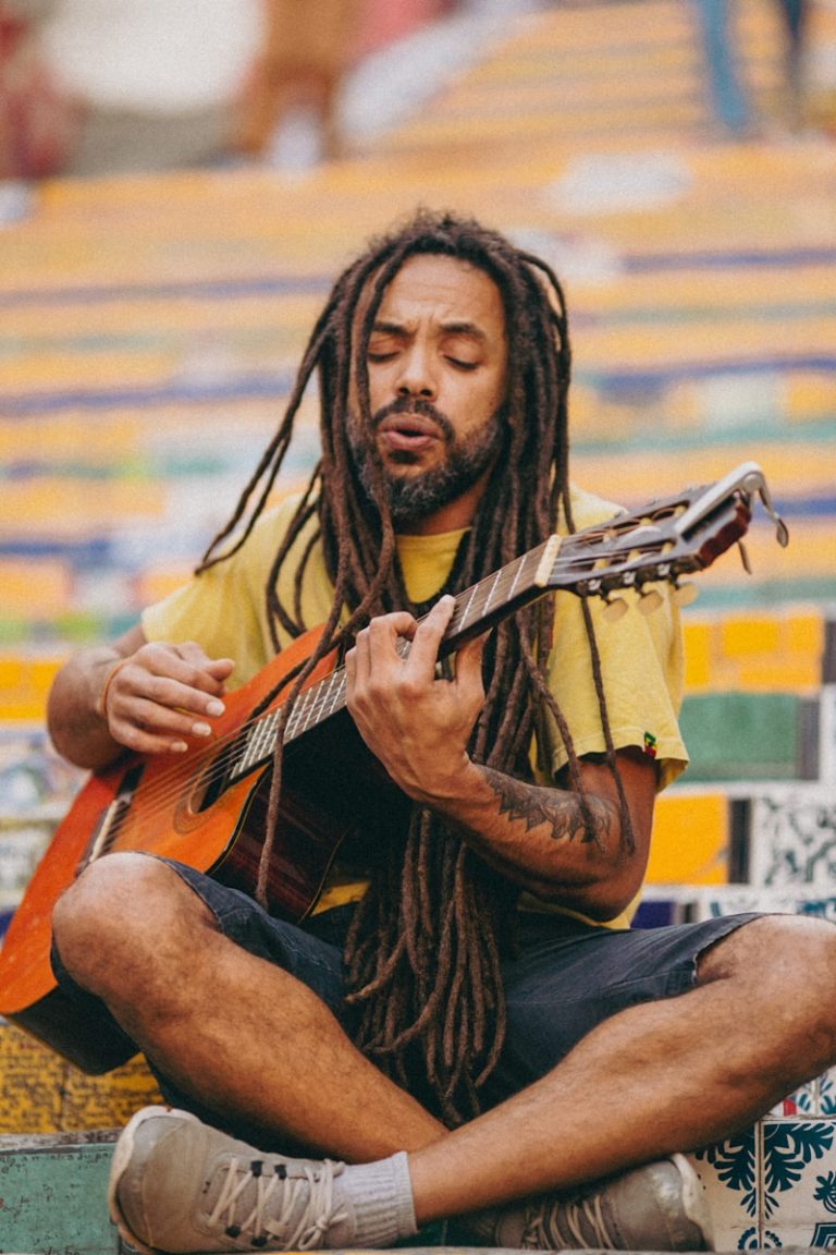 a man playing a guitar