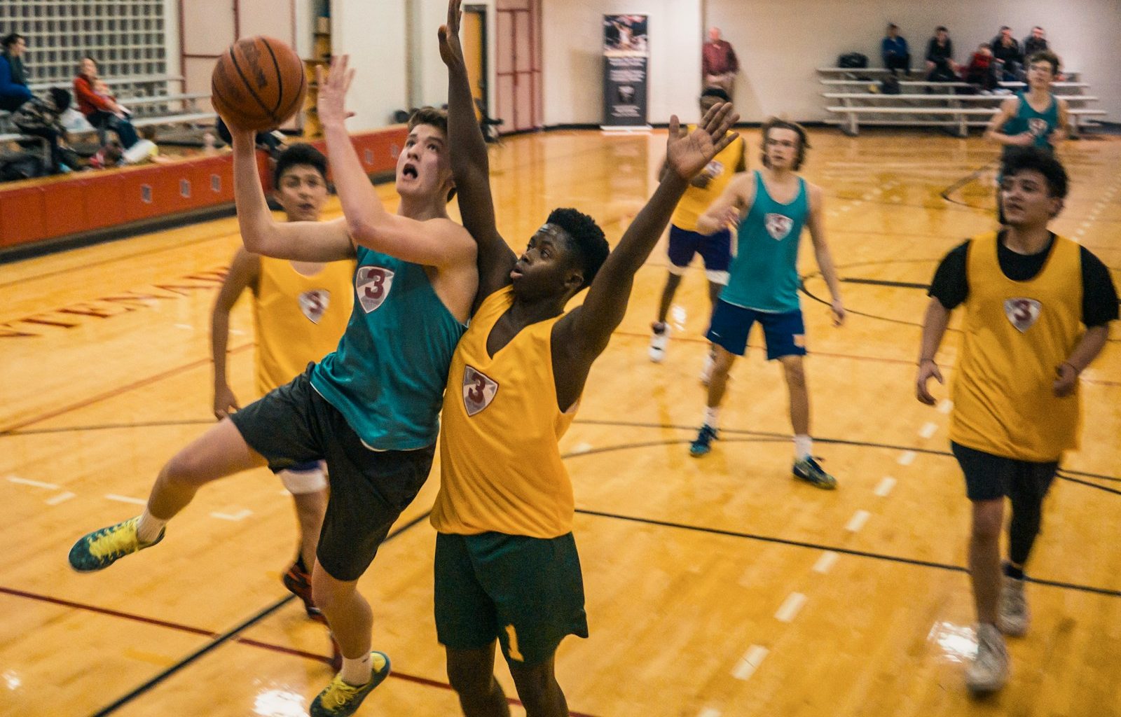 group of people playing basketball