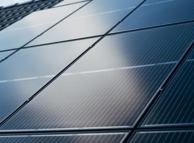 A close up of a solar panel on a building