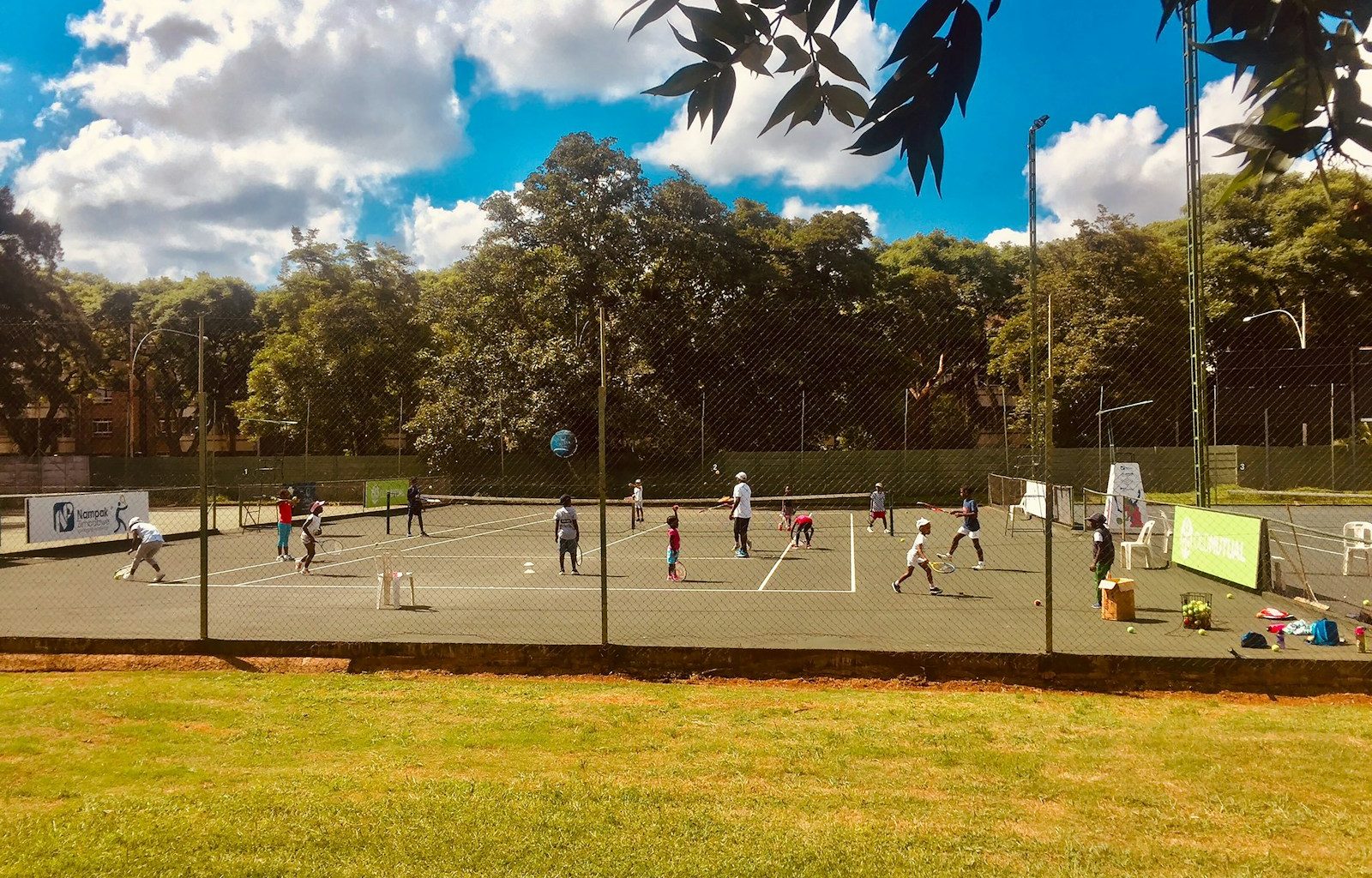 people in a court during daytime