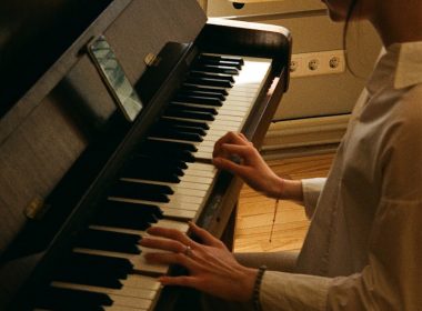 a man playing a piano