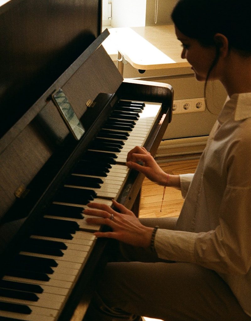 a man playing a piano