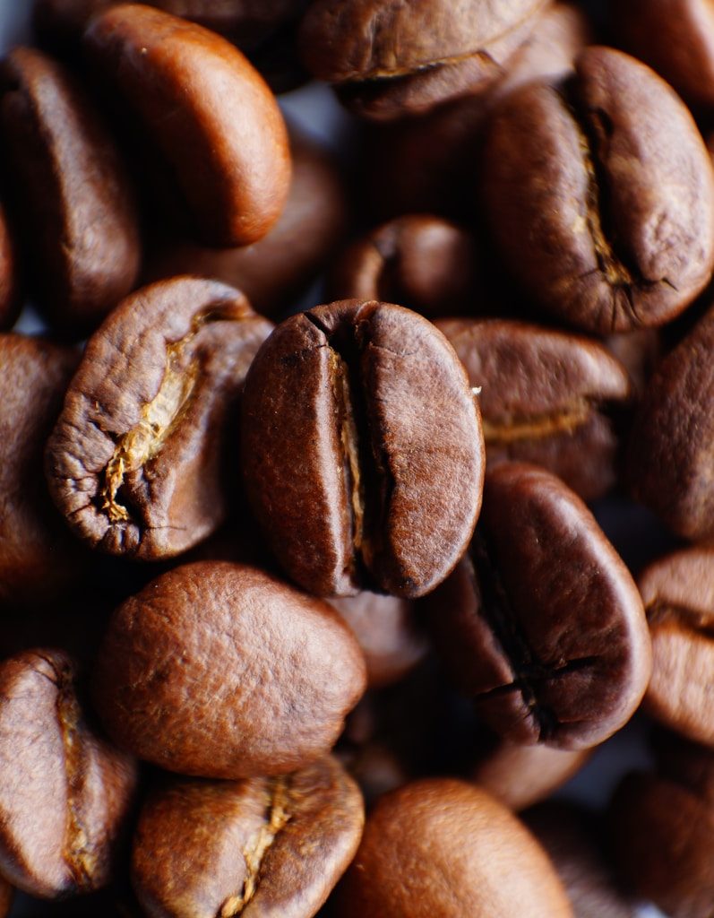 brown coffee beans in close up photography