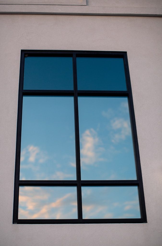 a window with a blue sky