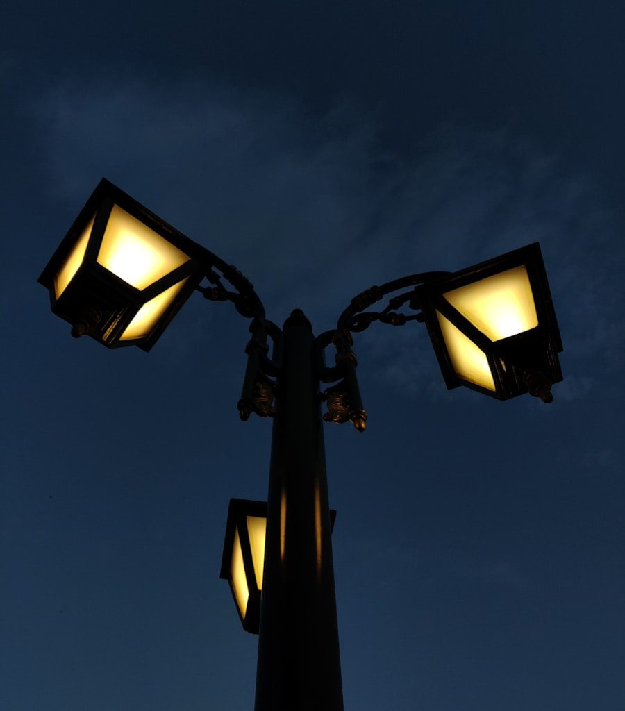 a street light with three lights on each of it's sides