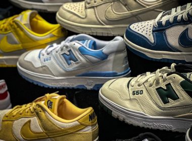 a bunch of different colors of shoes on display