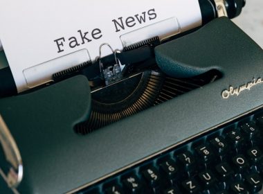 black and white typewriter on white table