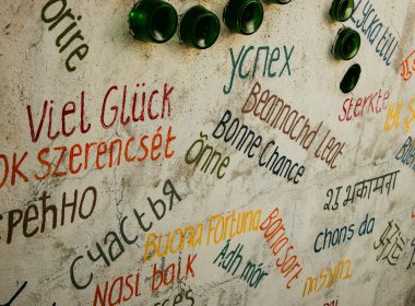 Various good luck wishes in different languages on wall