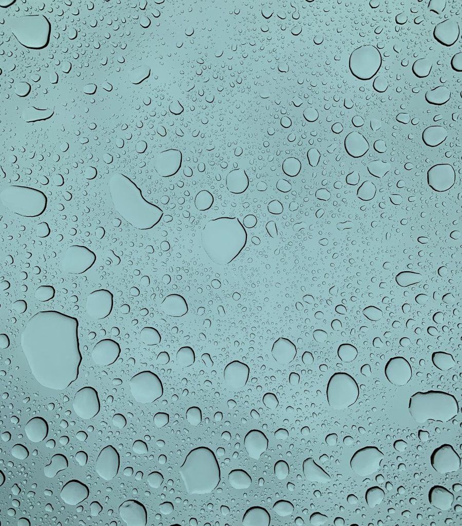 A close up of water droplets on a glass surface