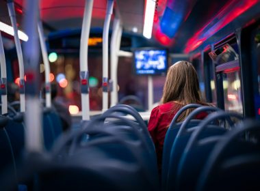 a person sitting on a bus