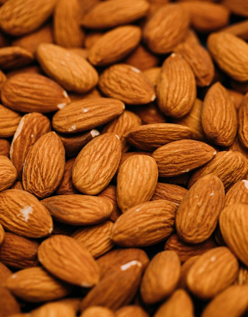 a pile of almonds sitting on top of each other