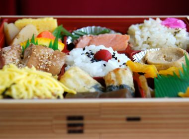 a wooden box filled with different types of food