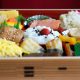 a wooden box filled with different types of food