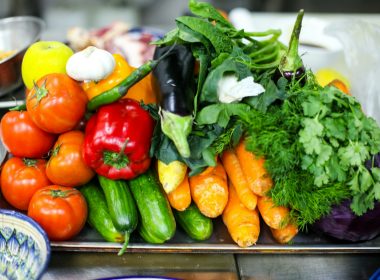 a pile of vegetables sitting on top of a table
