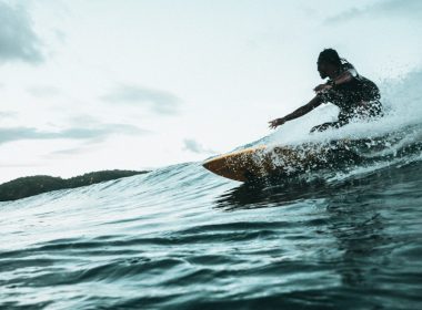 man surfboarding during daytime